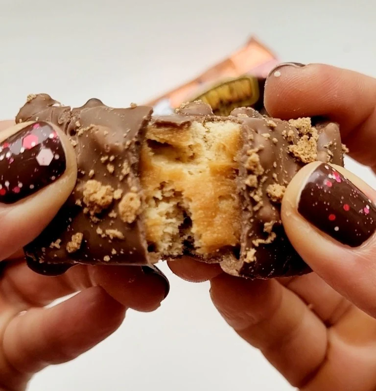 Battle Bites Jaffa Bake - podwójny baton białkowy z pomarańczowym toffee, karmelem i czekoladą - Image 6