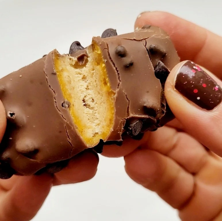 Battle Bites Jaffa Bake - podwójny baton białkowy z pomarańczowym toffee, karmelem i czekoladą - Image 8